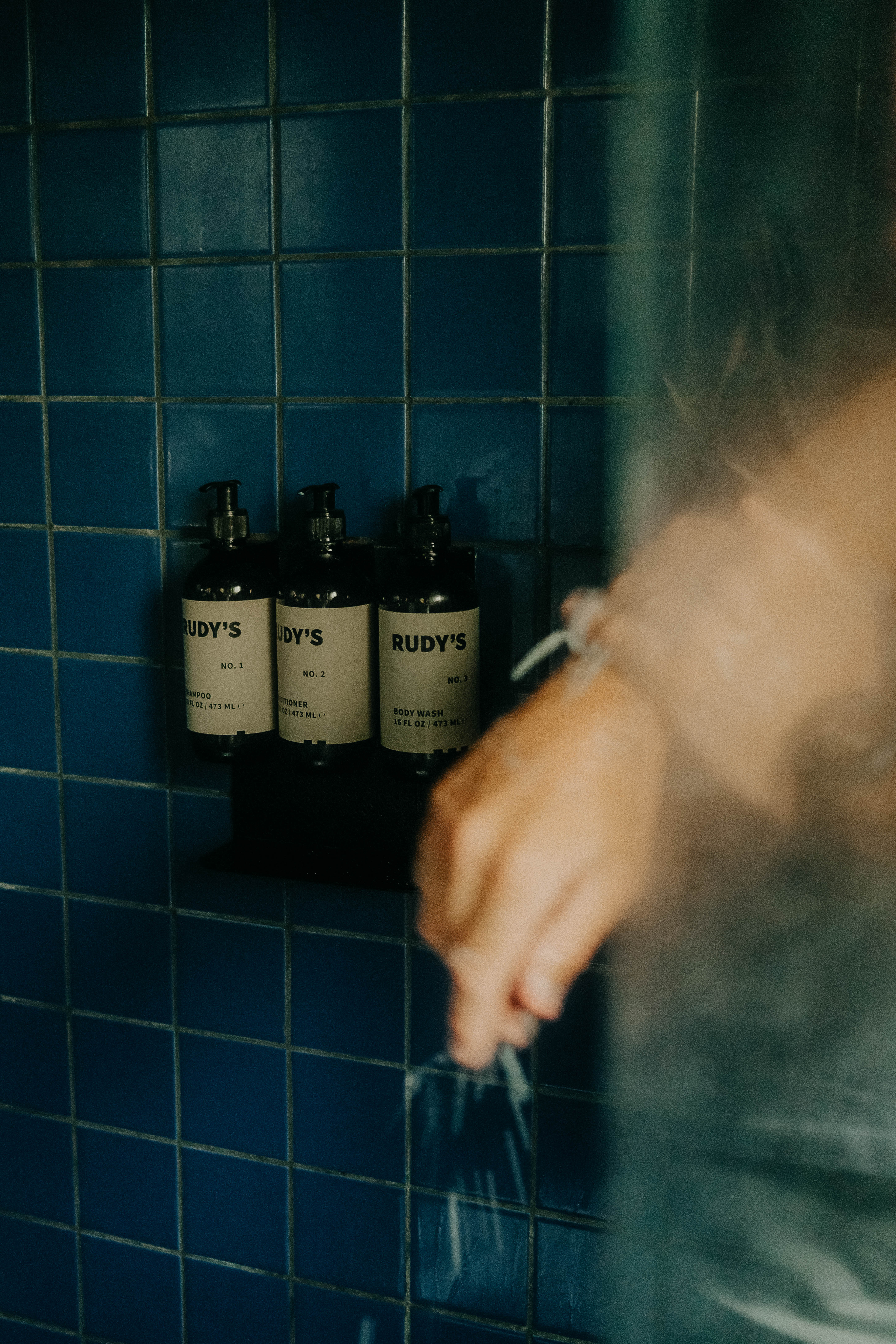 Image of soap dispensers in a shower